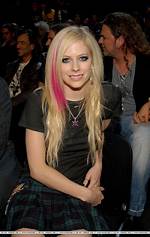 Exploring Avril Lavigne's Iconic Blonde and Black Hair Transformation
